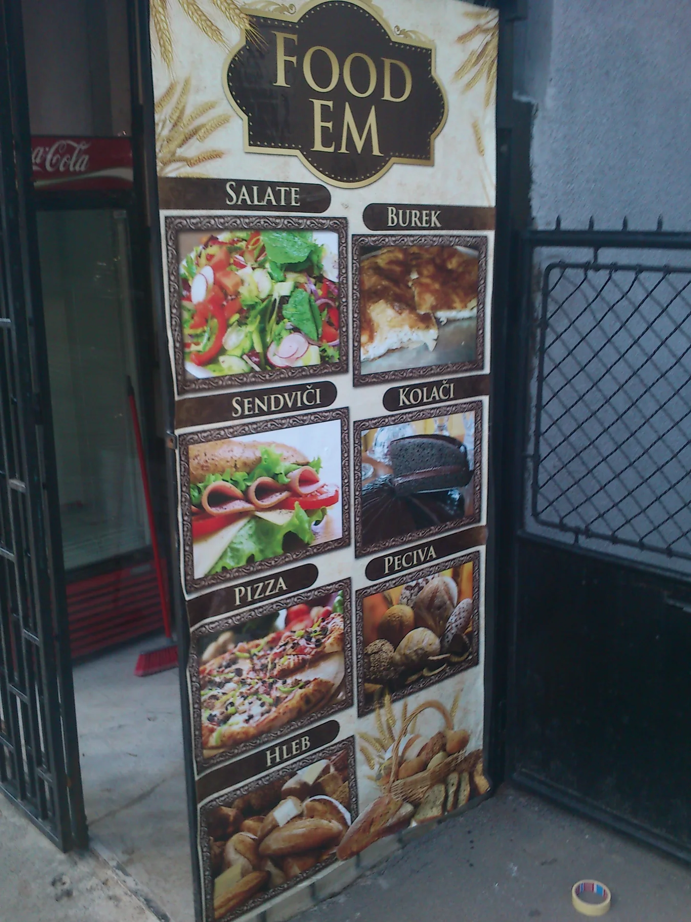 Brendiranje izloga za Food EM - Brendiranje prodajnih mesta Elite Print